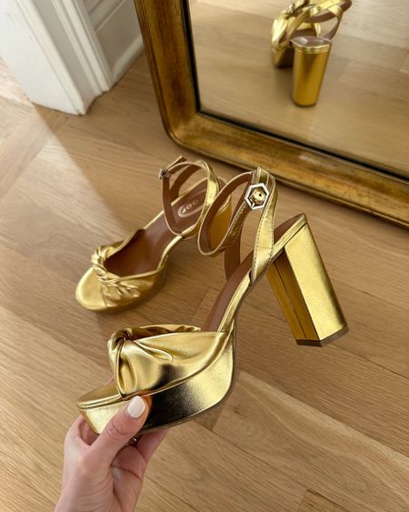Kat Jamieson shares gold platform heeled sandals. 

#LTKshoecrush #LTKHoliday #LTKfindsunder50
