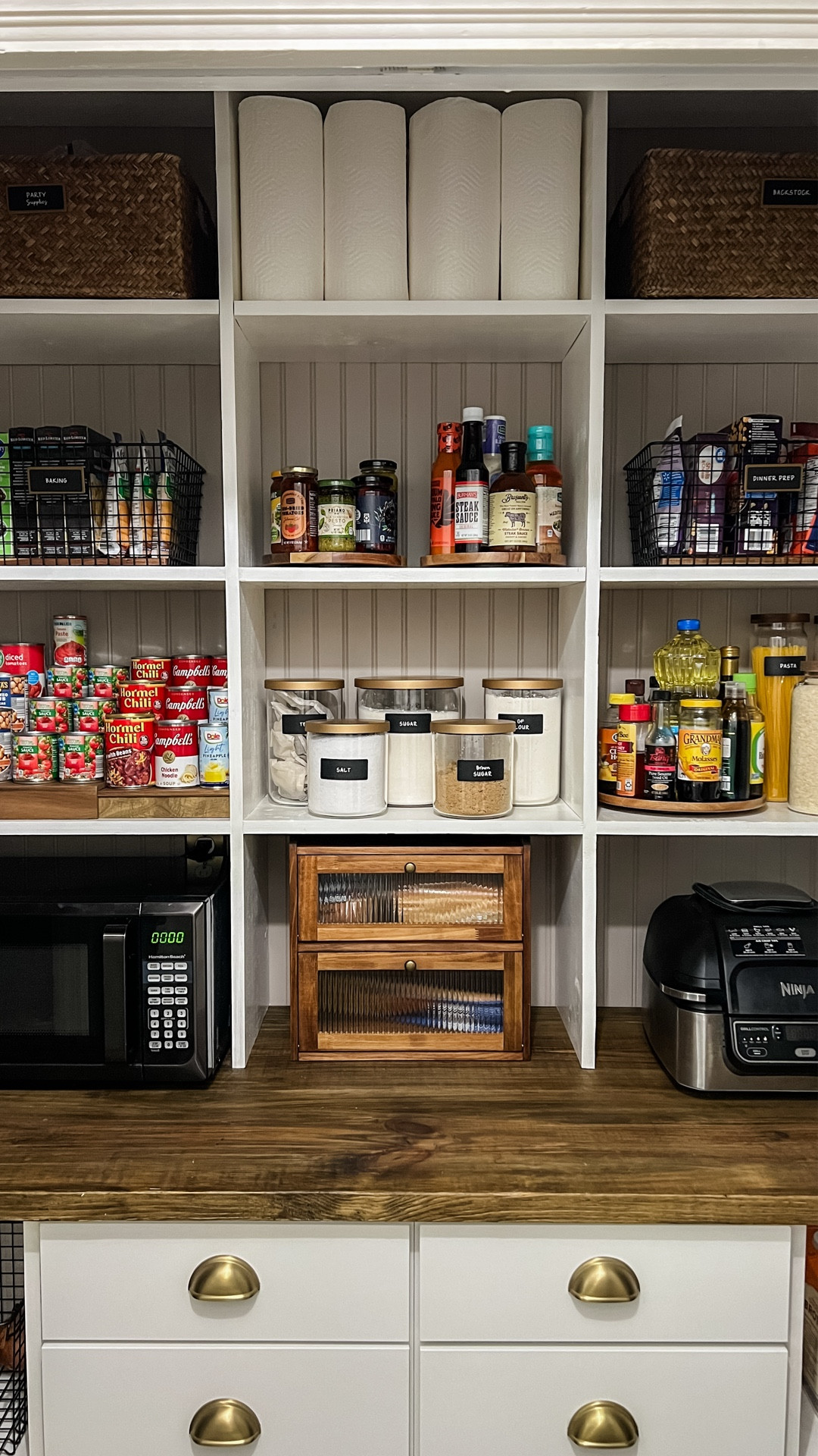 You can’t make real food in a real pantry look pretty, but nice organizers do help. 😁 I got all these from Neat Method and I love how fancy they look. I’m not really into the “rainbow pantry” vibe, just give me moody acacia wood and some gold lids and call it a day. 👏🏼

And in case you’re wondering, the rest of the food is hidden in the drawers below…because I have ninja cats that infiltrate the pantry at night and tear through bags of chips like raccoons in the rich neighborhood’s trash cans. 🦝



#LTKmomlife #LTKHome