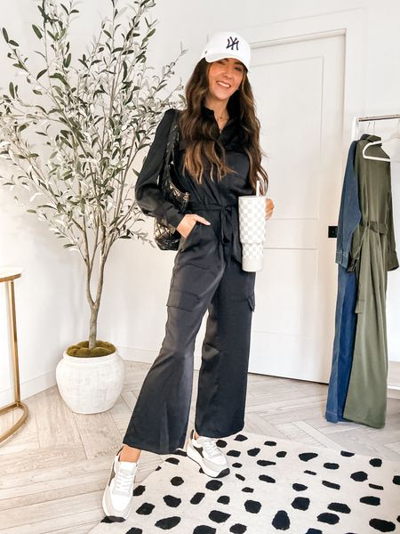 Black satin jumpsuit with tie waist under $50. Great for spring work wear or date night outfit. Dress it up or down with sneakers  

#LTKstyletip #LTKfindsunder50 #LTKworkwear