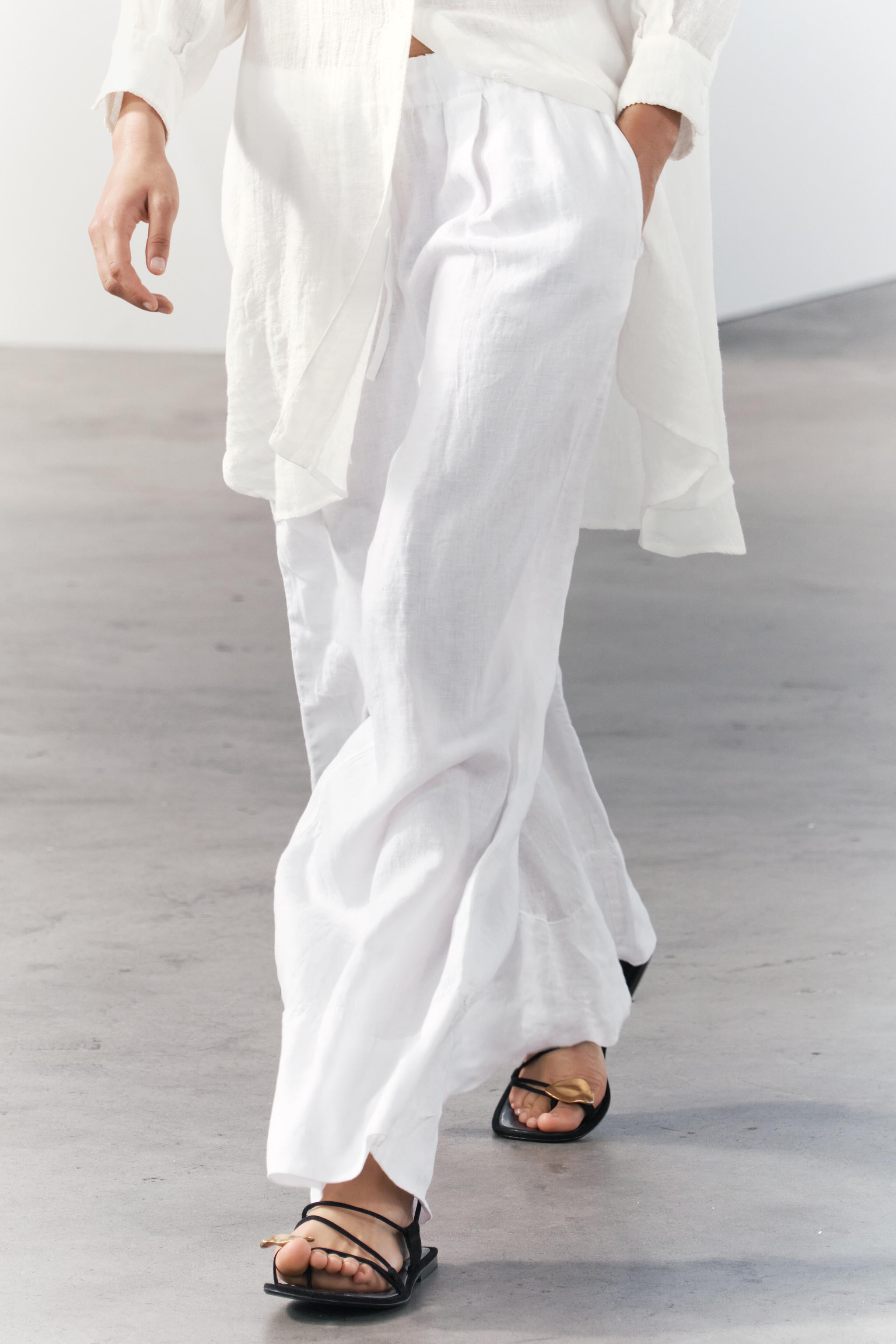 ZARA WOMAN COLLECTIONPants made of 100% linen fabric. Mid rise and elastic waistband with adjusta... | Zara US