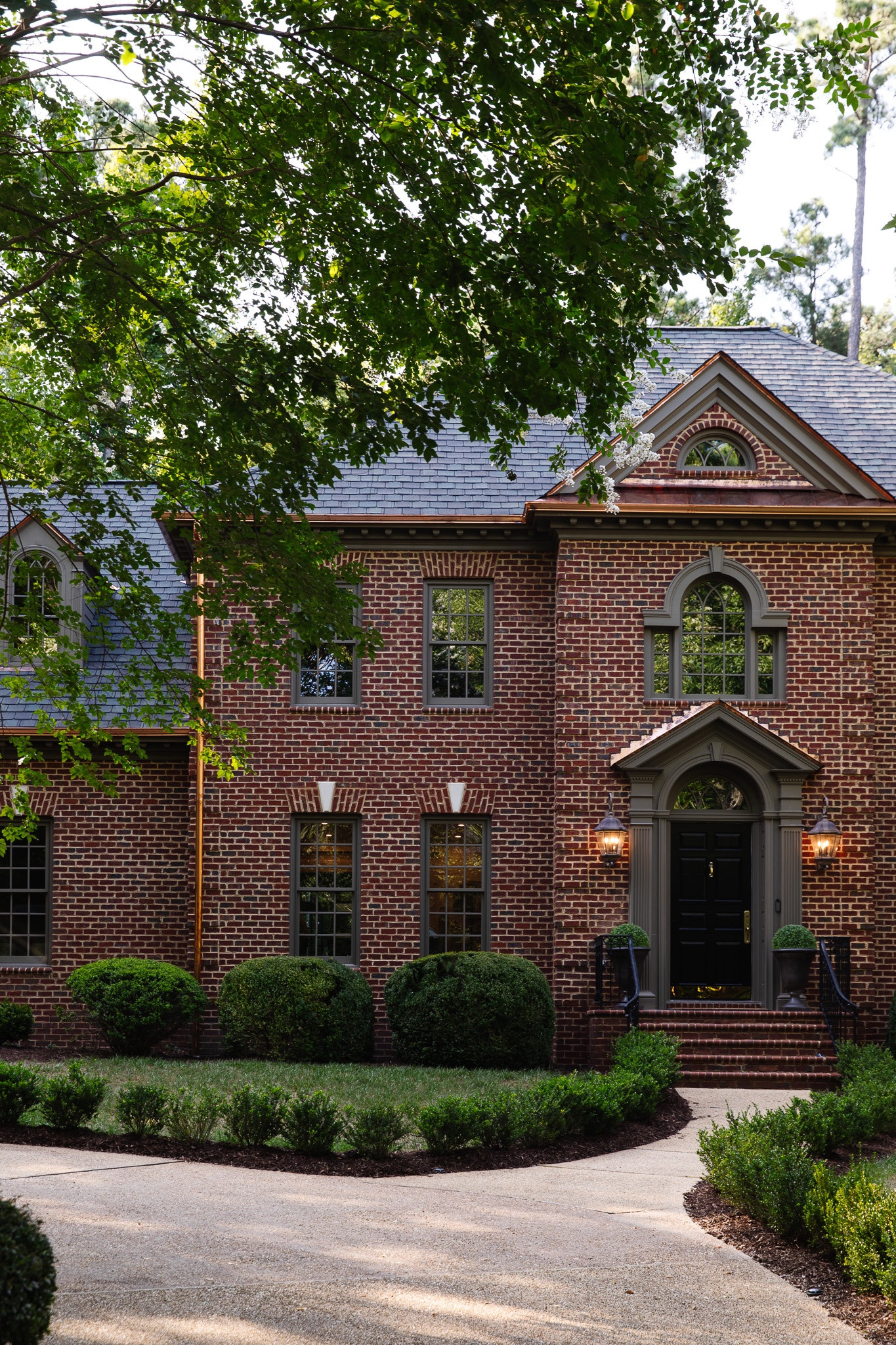 Our copper gutters were finally installed this week and they are the perfect moody, modern, traditional addition to our home 🤎 sharing all about them (including how much they cost) today at ChrisLovesJulia.com.

Planter, topiary, outdoor wall lanternn

#LTKHome #LTKSeasonal #LTKStyleTip