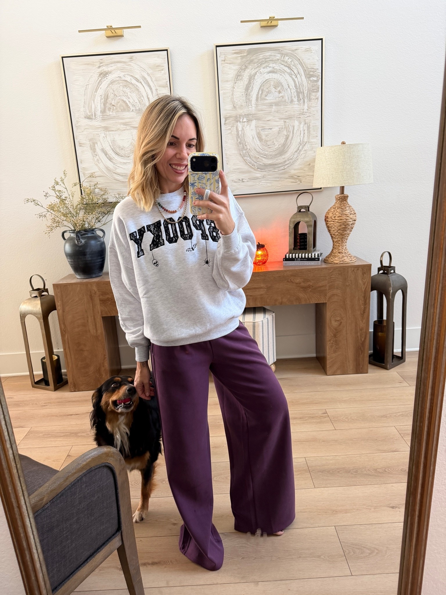 Where my true so small in these wide leg sweatpants that are my absolute favorite right now and my new spooky sweatshirt.