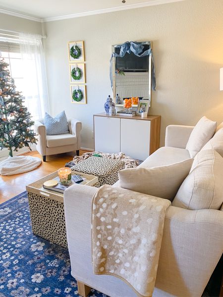 Our home decorated for Christmas this year 🎀🍊💙

Home decor // Christmas decor // living room // couch // 

#LTKHoliday #LTKhome #LTKSeasonal