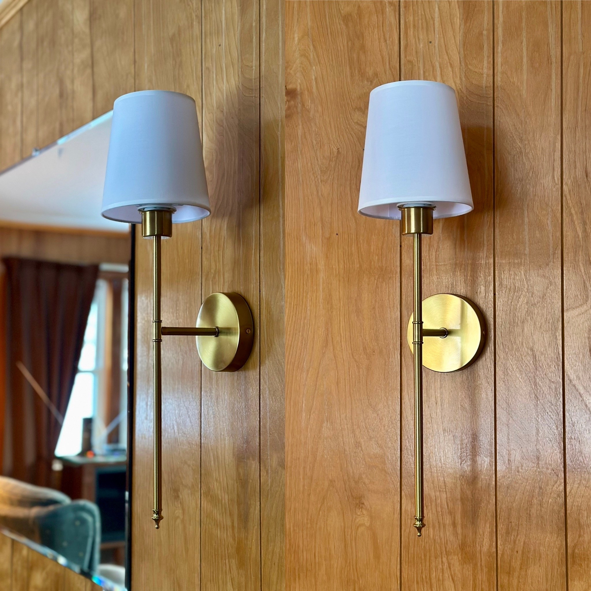 Wall sconces we put up at my grandmas ! Battery operated light bulbs with remotes ! Amazon find 

#LTKHome