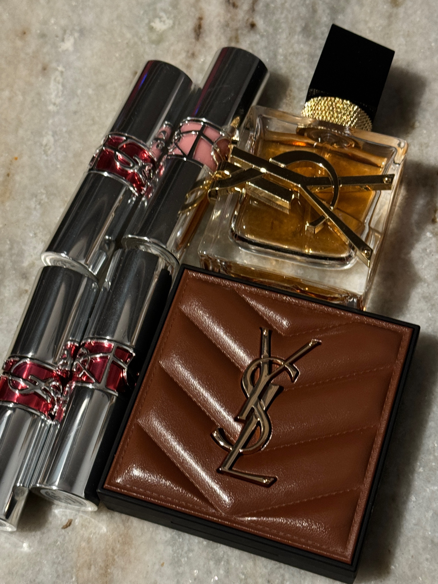 YSL beauty! 

YSL Libre Eau De Parfum Intense
YSL All Hours Hyper Bronze 
Rogue Volupte Candy Glaze - 13, 15, 02
YSL LOVESHINE -204