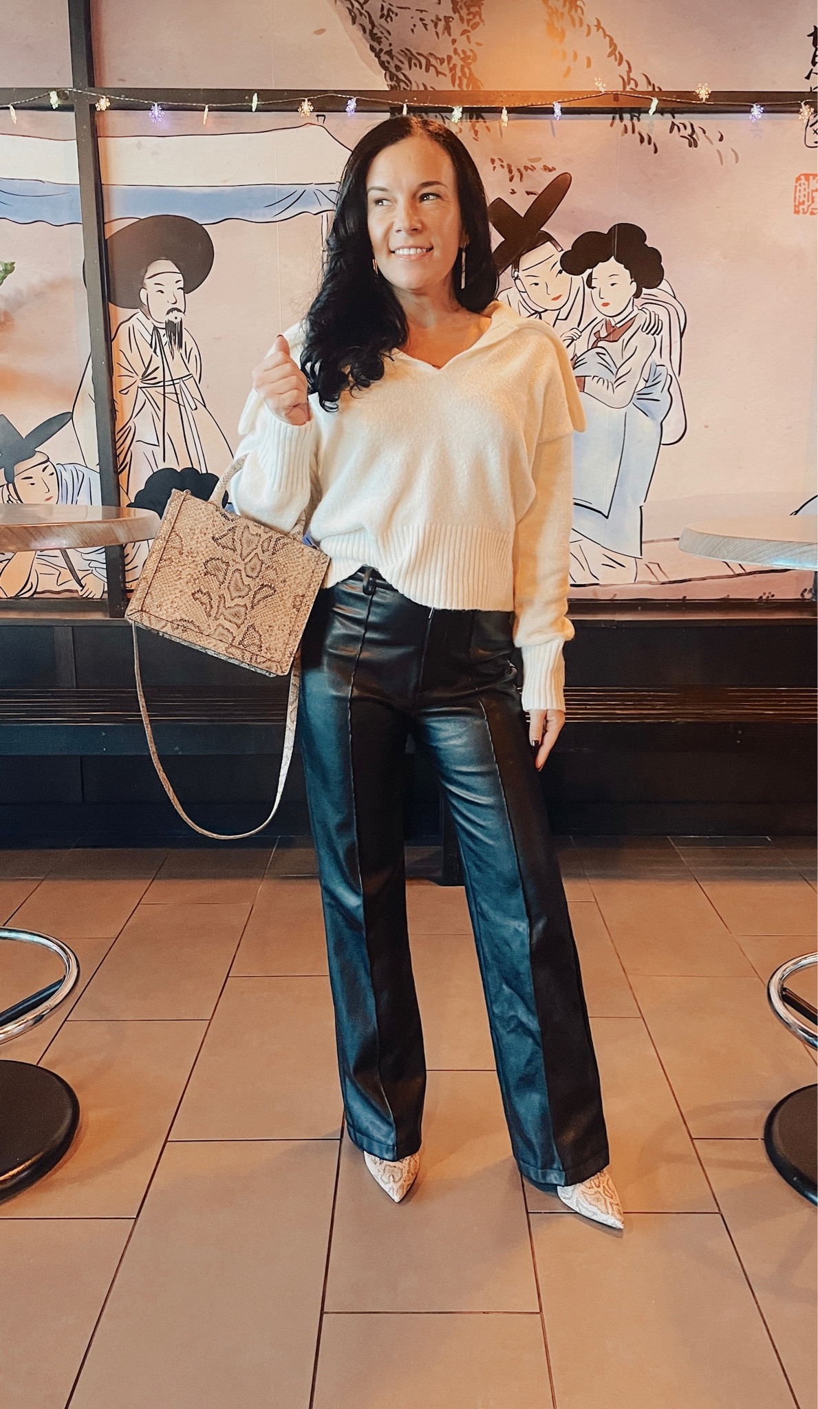 Boots and matching handbag that makes a statement. Paired with cozy sweater and faux leather wide leg trousers. Perfect lunch date outfit. 

#LTKsalealert #LTKstyletip #LTKshoecrush