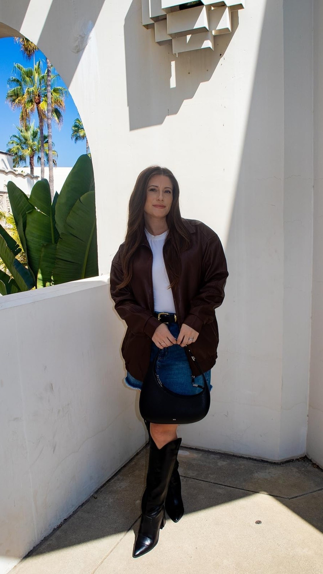 Spring Date Night Outfit | Amazon Faux Leather Jacket & Nordstrom Denim 🤎👠✨
Elevate your spring date night look with this effortless, high-low combination. I’ve styled a trending Nordstrom denim mini skirt with affordable amazon fashion finds for the ultimate transitional outfit from winter to spring.

The base is a simple white tee, instantly elevated by an oversized brown faux leather jacket (the color of the season!). Complete the look with sleek pointed-toe knee-high boots and a classic black shoulder bag—all from Amazon. Perfect for dinner, drinks, or a chic daytime look.

Shop the Look:
Skirt: Nordstrom Denim Mini - linked some similar styles as welll
Jacket: Amazon Brown Faux Leather Bomber - wearing size Small 
Boots: Amazon Pointed Toe Knee High Boots 
Tee: Amazon Basic White Crewneck
Bag: JW PEI Black Shoulder Bag

#LTKPetite #LTKgrwm #LTKootd