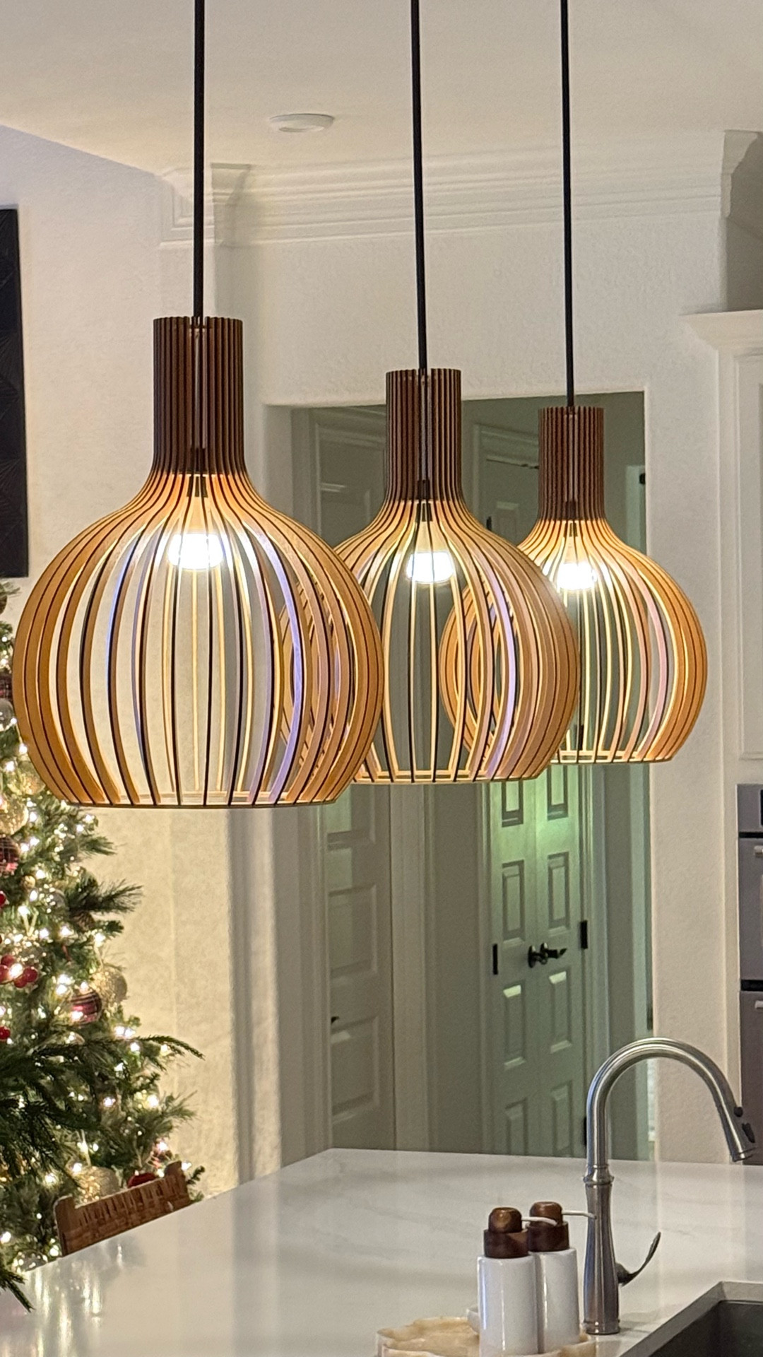 Beautiful wood pendant lights that change the whole feel of your kitchen
The glow at night adds the perfect warmth and makes the room feel softer.
The sculpted wood ribs, rounded silhouette, and bright downward light add both style and function.

#kitchenlighting #modernhome #lightingupdate #cozyhomeideas #ltkhome

#LTKHome