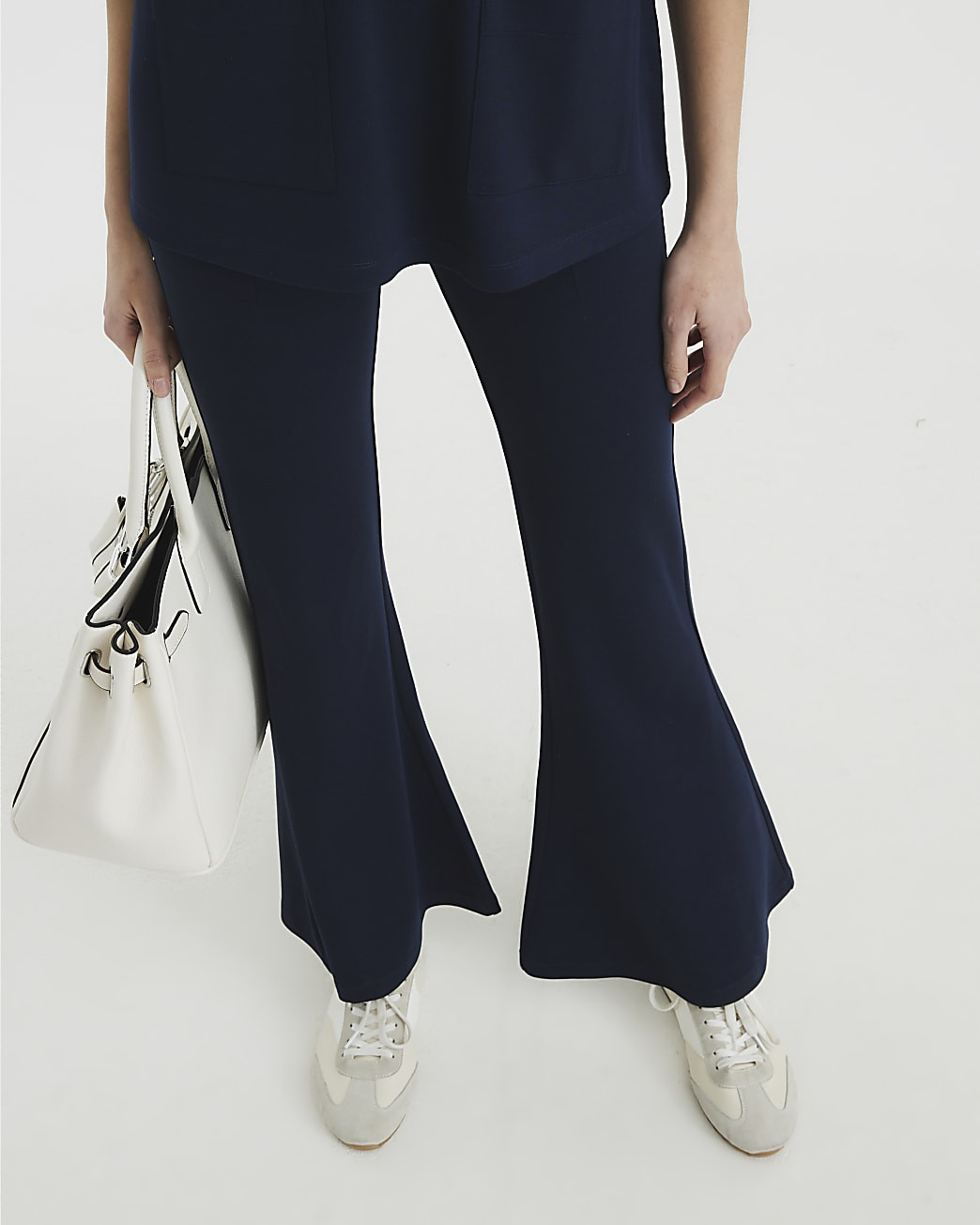 Navy Ponte Pull On Kickflare Trousers | River Island UK & IE