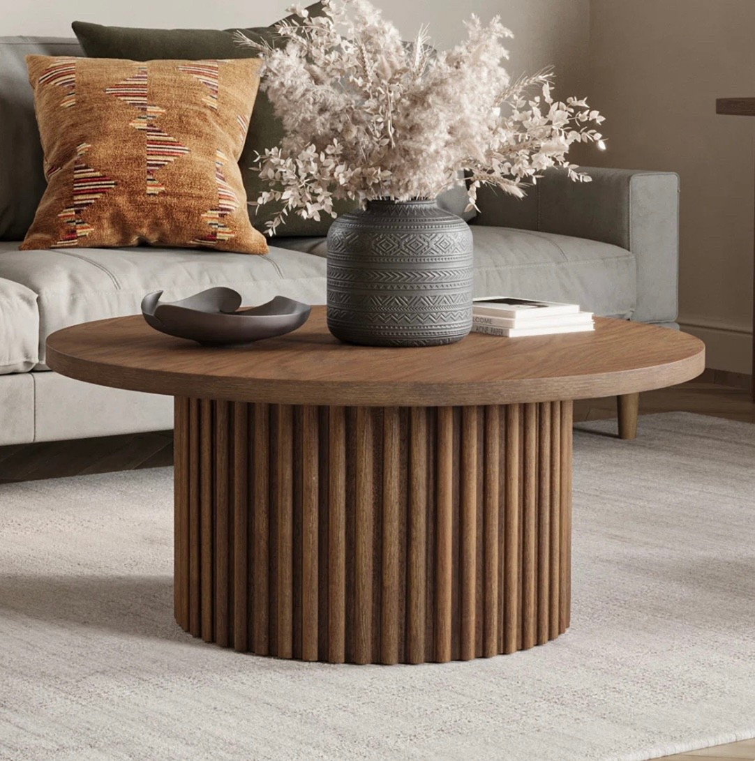 This is it. Beautiful dark wood round coffee table from wayfair. 

#LTKHome #LTKSaleAlert #LTKSpringSale