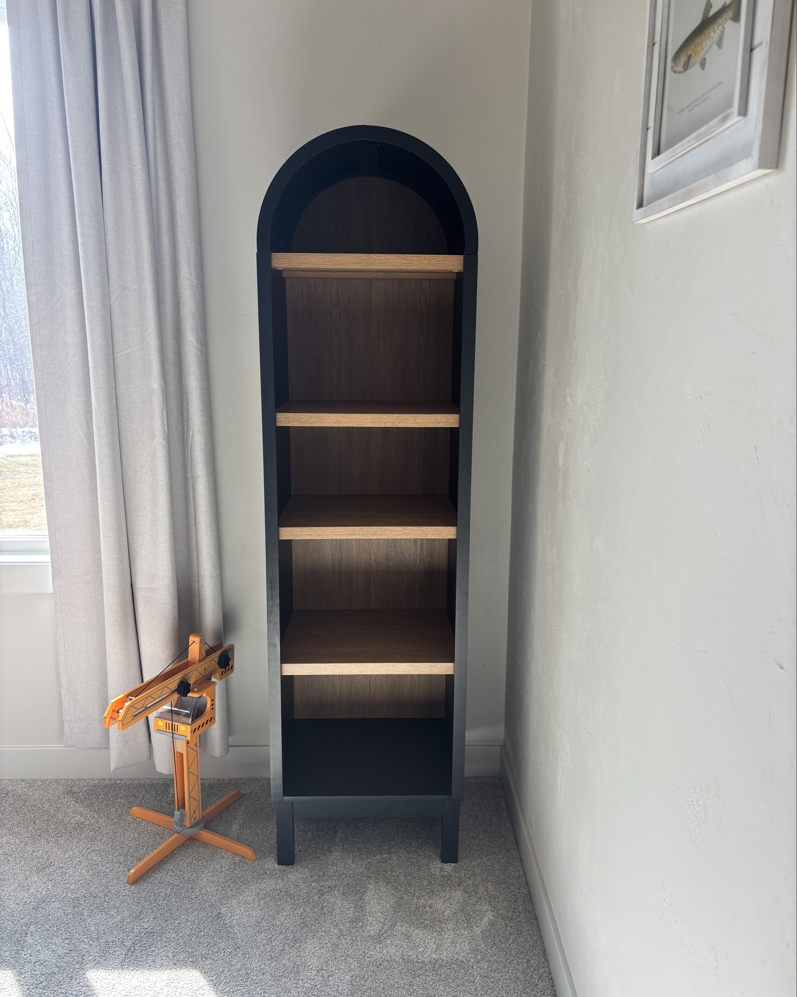Under $200 arch bookcase🖤 - stay tuned for how it gets decorated in our little guys room!

#LTKkids #LTKhome