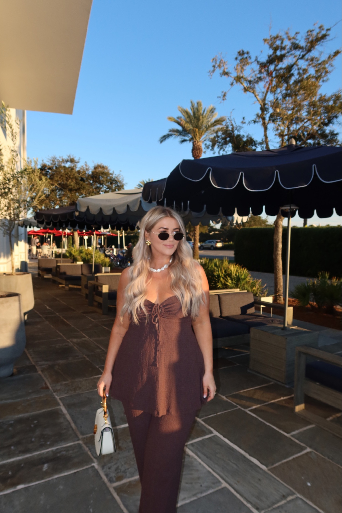 Sooo obsessed w this jumpsuit🤎 the brown is almost sold out but they have other colors!! The white would be SO pretty for a bride. I am in an XL #bridal #jumpsuit 

#LTKtravel #LTKmidsize #LTKstyletip