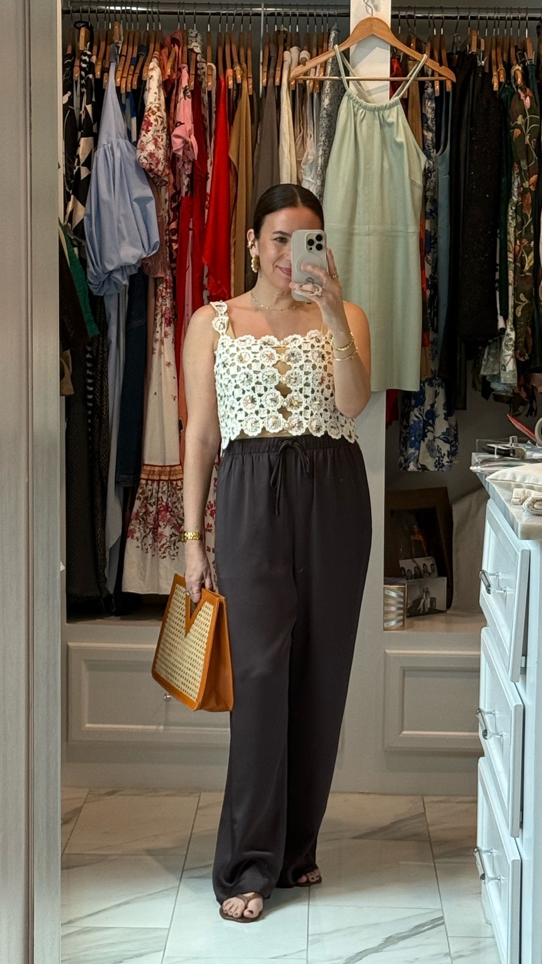 As the seasons change I love experimenting with seasonal colors and textures ✨ Crochet top, silk pants, raffia bag & jelly shoes 🤌🏼

#LTKootd #LTKgrwm #LTKdayinmylife