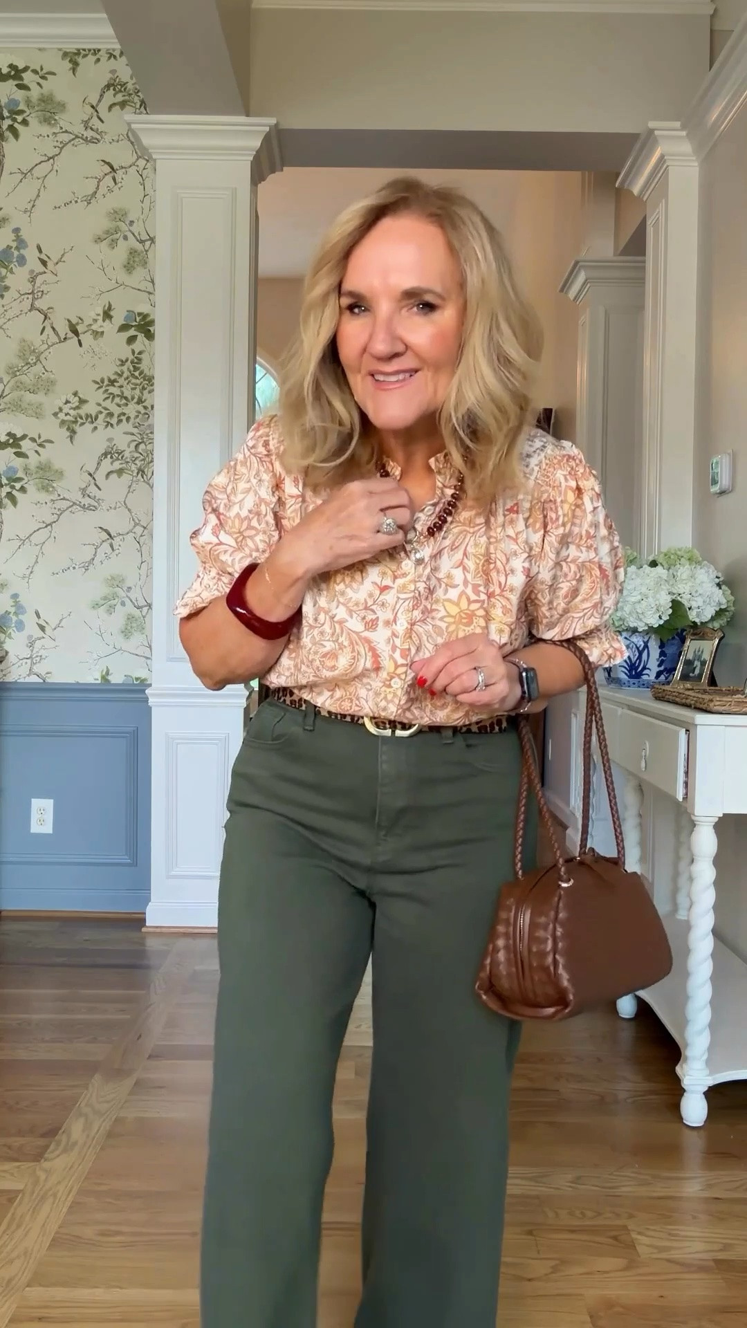 This is one of those outfits that can take you just about anywhere. I’m wearing a medium in the top and a 29 in the jeans, and the soft print with those wide-leg jeans feels easy but still pulled together.

#LTKootd #LTKgrwm #LTKOver40