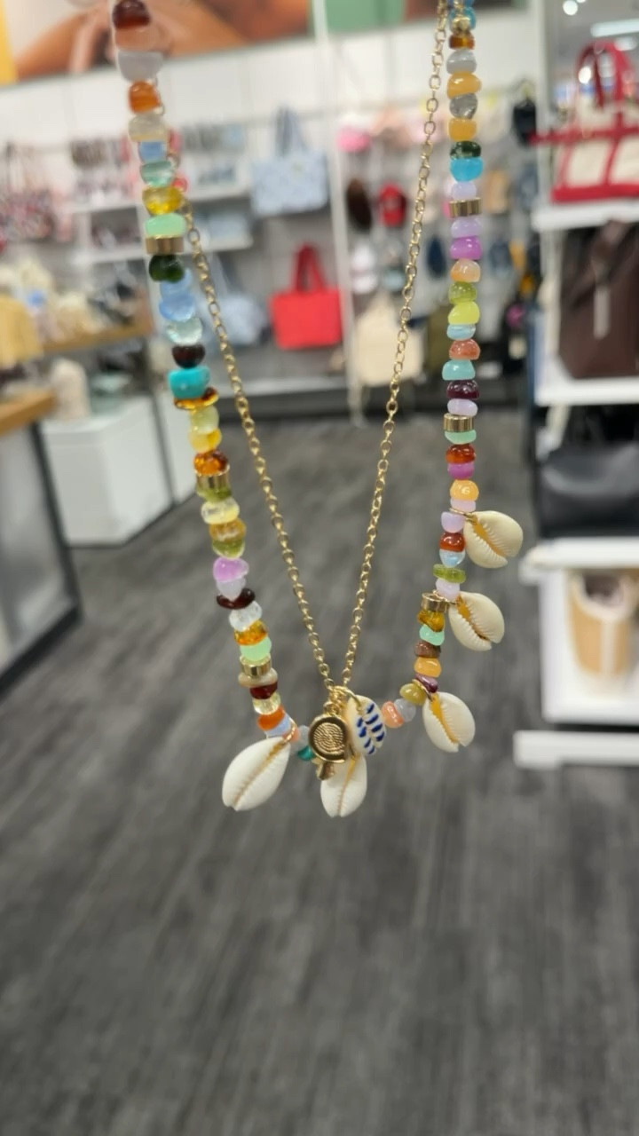 This layered necklace is such a fun summer statement. I love the mix of colorful beads with the shells, it instantly makes any outfit feel more vacation ready. So cute with a simple tank or swimsuit

summer jewelry, beach style, layered necklace, colorful accessories, vacation outfits, coastal vibes, themominstyle 

#LTKootd #LTKSeasonal #LTKTravel