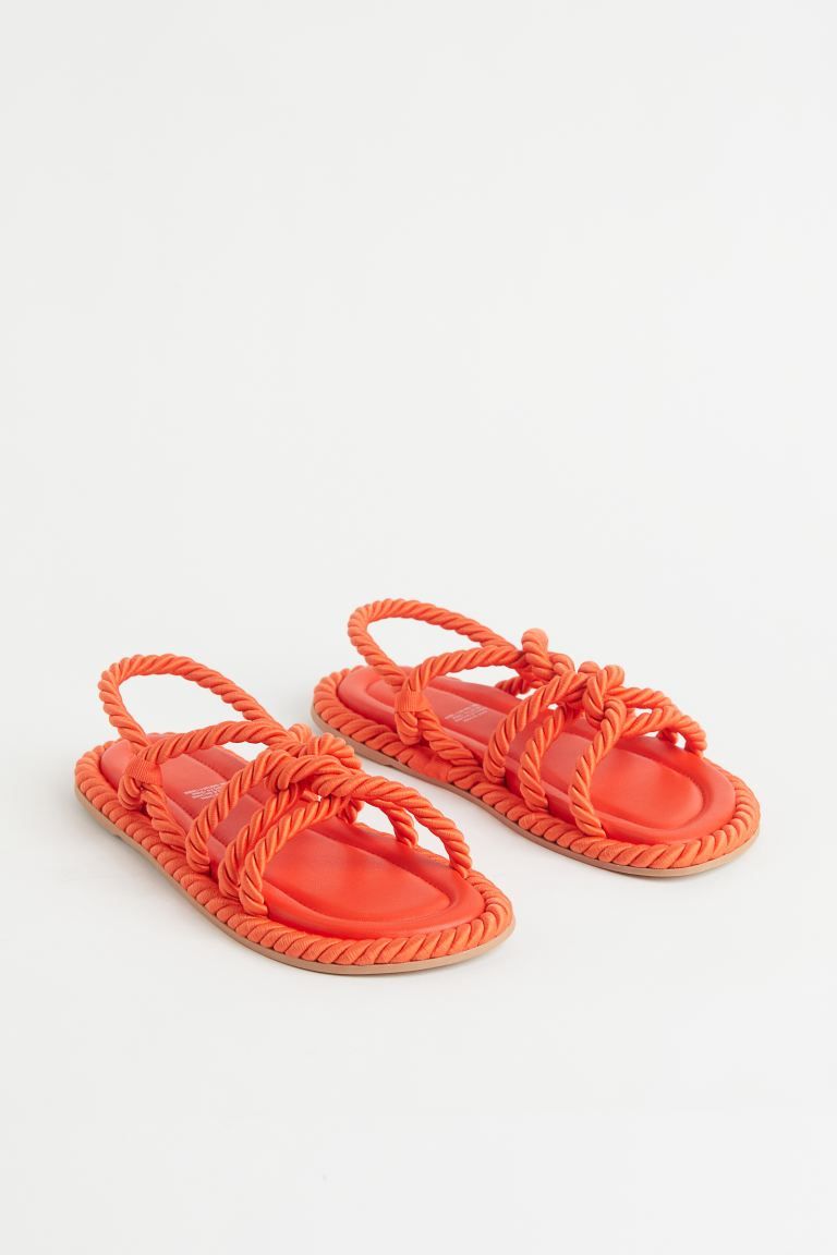 Sandals with twisted, rope-style foot straps. Soft faux leather insoles and fluted soles. Sole th... | H&M (US + CA)