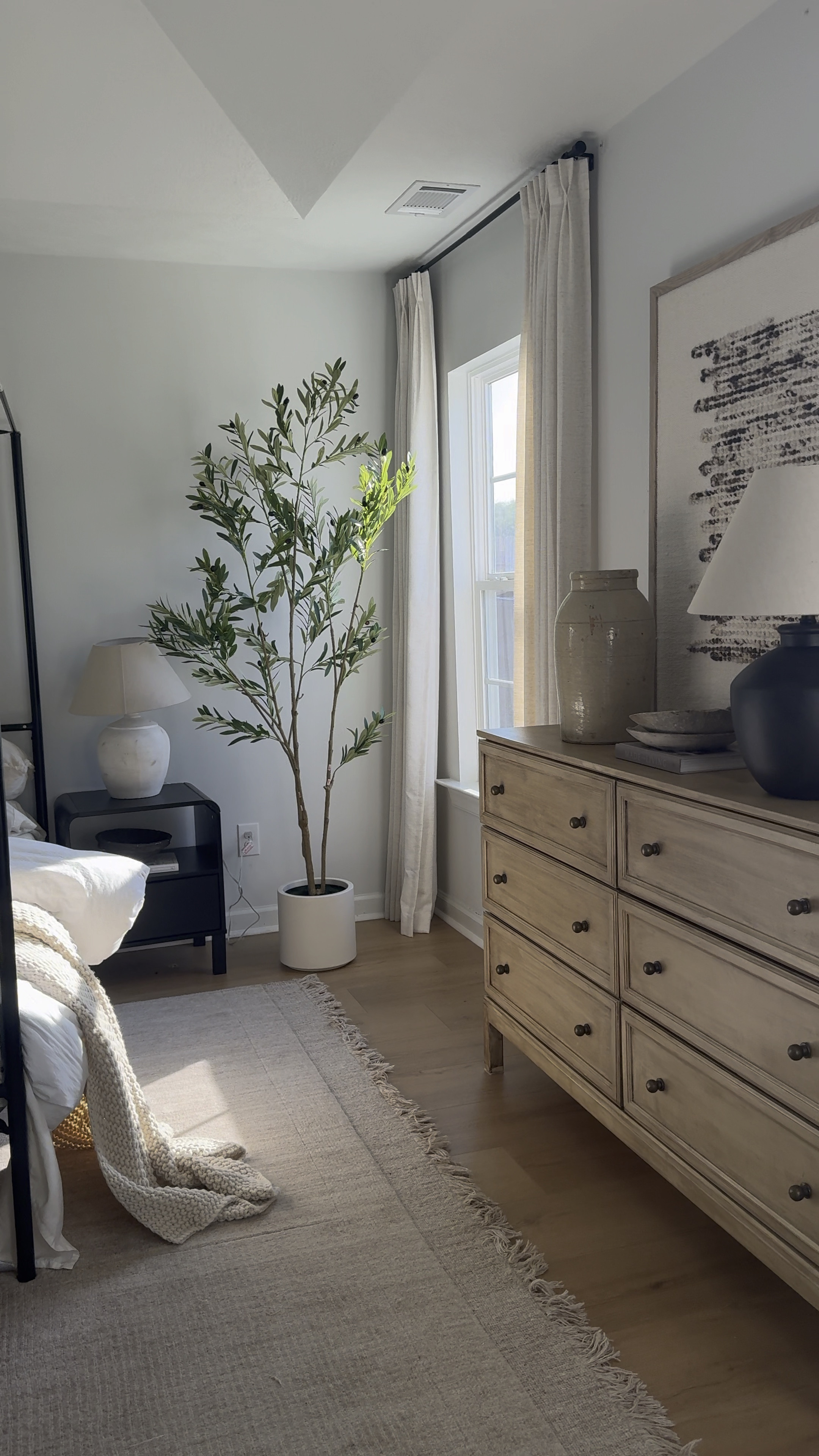 Organic modern bedroom with finds mainly from Amazon, Walmart & Target. 

Canopy bed, ikea tarva dresser, faux tree, Walmart lamp, oversized lamp, textured wall art, rugs USA rug, pet friendly rug, kid friendly rug, black nightstands, lamps, Turkish pots, croc, white bedding, lumbar pillow, throw pillow combo, curtains, linen curtains, white desk, arch mirror