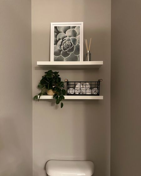 Bathroom floating shelves & decor! 
Bathroom decor 
White floating shelves 
Target home 
Target sale 

#LTKhome #LTKSeasonal #LTKsalealert