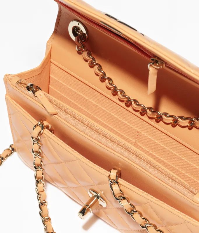 Wallet on chain - Lambskin, gold-tone & lacquered metal, orange — Fashion | CHANEL | Chanel, Inc. (US)