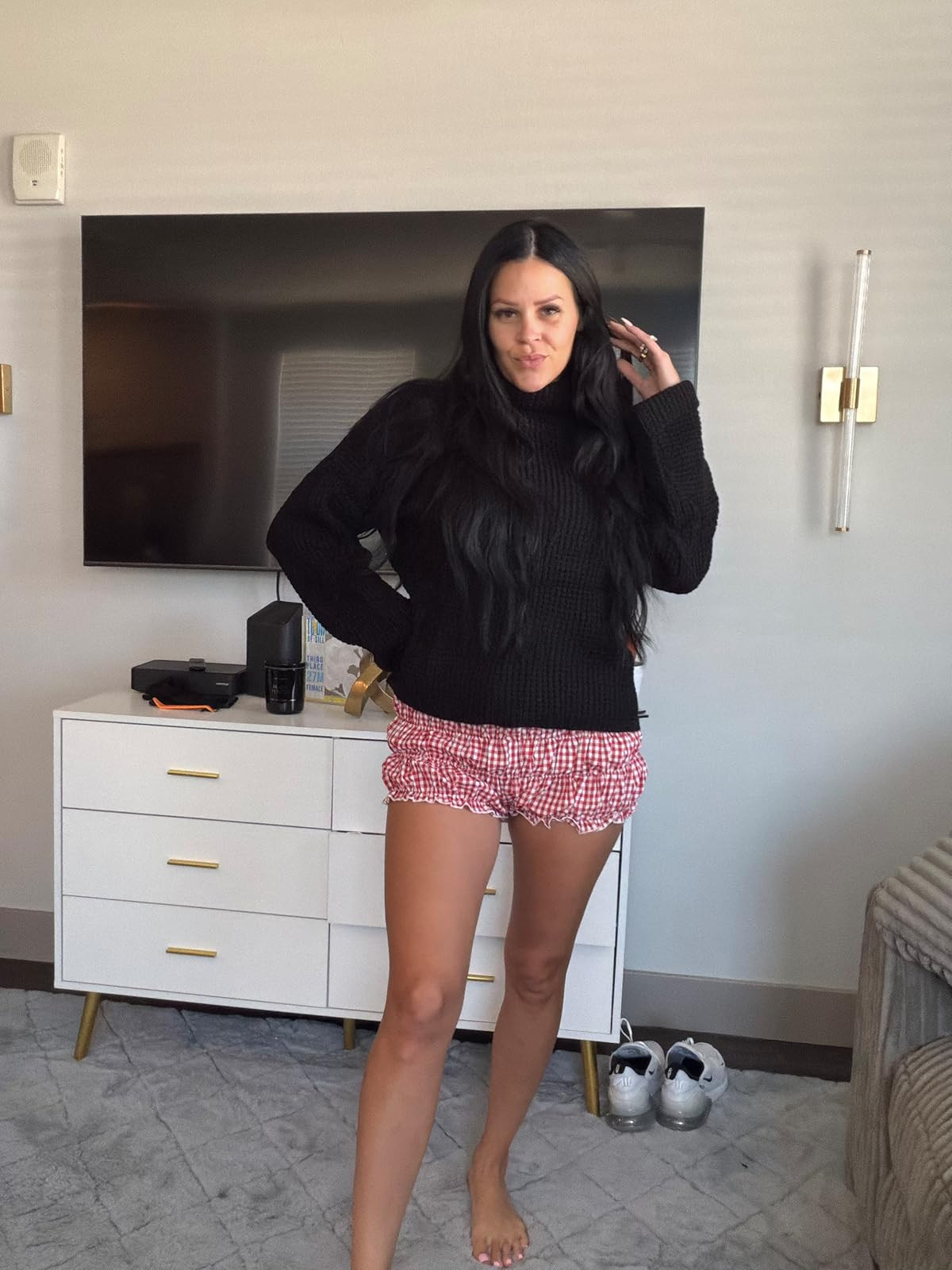 Chunky black knits paired with sweet gingham ruffles. #CozyStyle #GinghamShorts #Loungewear 

 #LTKdayinmylife #LTKootd #LTKSaleAlert