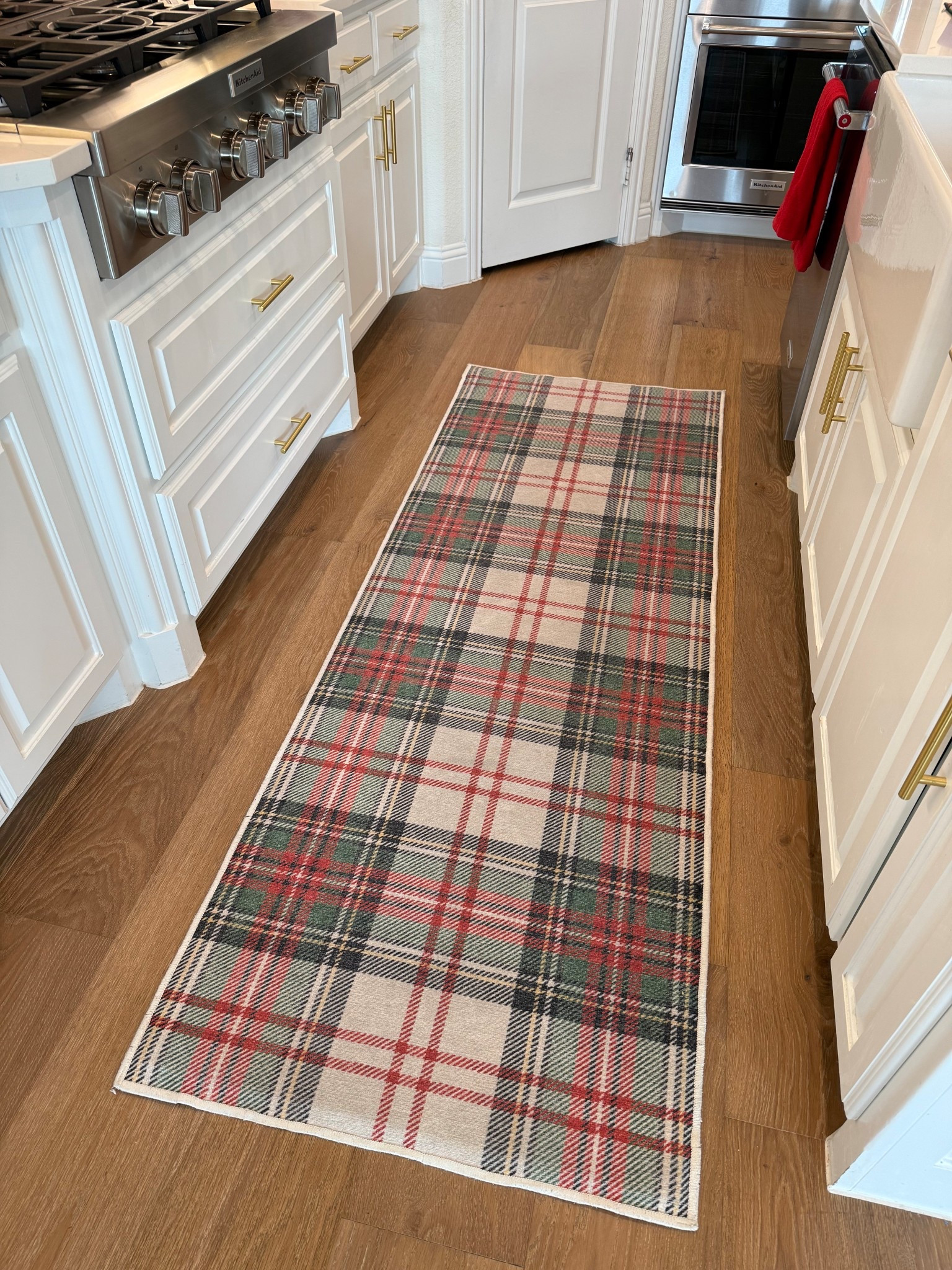 Christmas kitchen runner ♥️ love this beautiful holiday plaid! Ruggable rugs are my favorite - machine washable, stain resistant and they last forever! I’ve had this one for 3 years and it still looks brand new ✨

#ruggable #christmasrug #kitchenrunner #christmasplaid #holidayplaid #ralphlaurenchristmas #christmaskitchen #holidaykitchen #kitchendecor #christmasdecor #plaidrug #christmadecorating #homedecor #decoratingideas 

#LTKHome #LTKHoliday #LTKmomlife