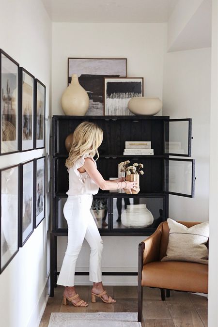 This cabinet is one of my favorite spaces in our home to style  

#LTKstyletip #LTKfamily #LTKhome