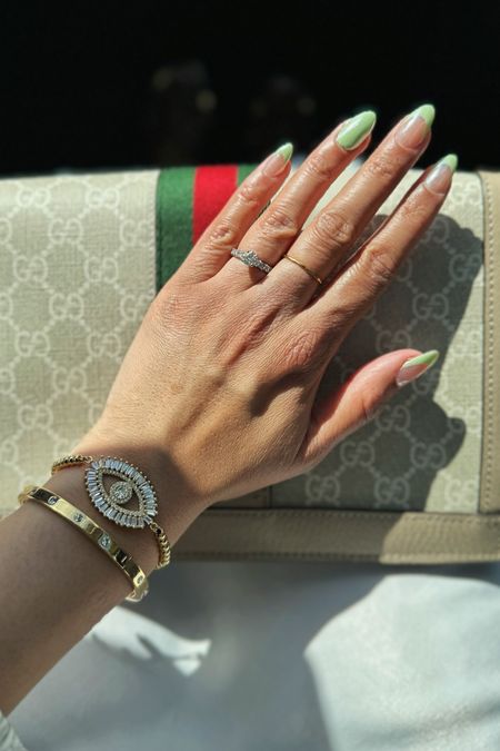 Matcha nails! This spring nail color is so pretty, glazed it too! Wearing evil eye bracelet, Kate spade bracelet and Gucci! 

Accessories / wedding guest dress / spring outfit / spring nails / amazon jewelryy