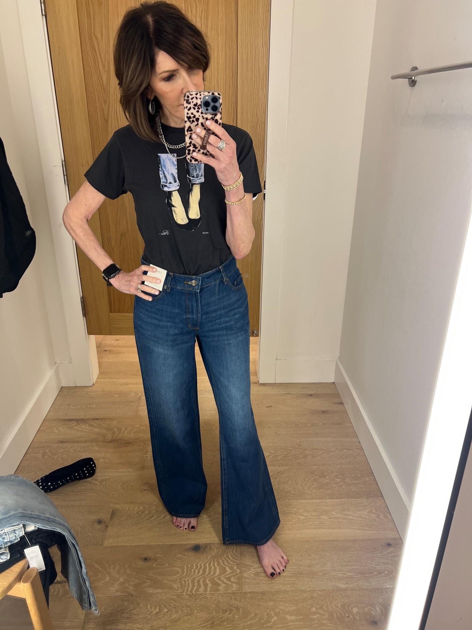 mid rise relaxed flare jeans, graphic tee, gold hoop earrings, over 50 outfits 

#LTKOver40 #LTKSeasonal #LTKootd