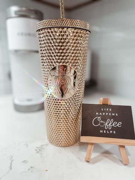 The perfect gold studded Starbucks tumbler! I found mine in store but they are also being resold online!

I tagged a few coordinating coffee lover products and my mini keurig as well! 

#LTKhome #LTKGiftGuide #LTKHoliday