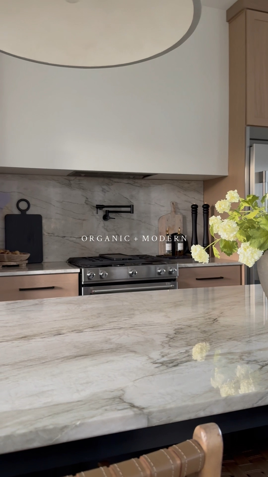 For the ones drawn to organic modern design, calm spaces with simple styling, and a mix of moody + bold neutrals that never feel boring...

Welcome. You're in the right place 🖤

Follow @ourmidwayhome for home design inspiration + sources

**Faux olive tree and planter are from Costco but currently out of stock 🫒🌿 

#homeinspo #homedetails #organicmodern #interiordesign #neutralhomedecor 

#LTKSaleAlert #LTKHome