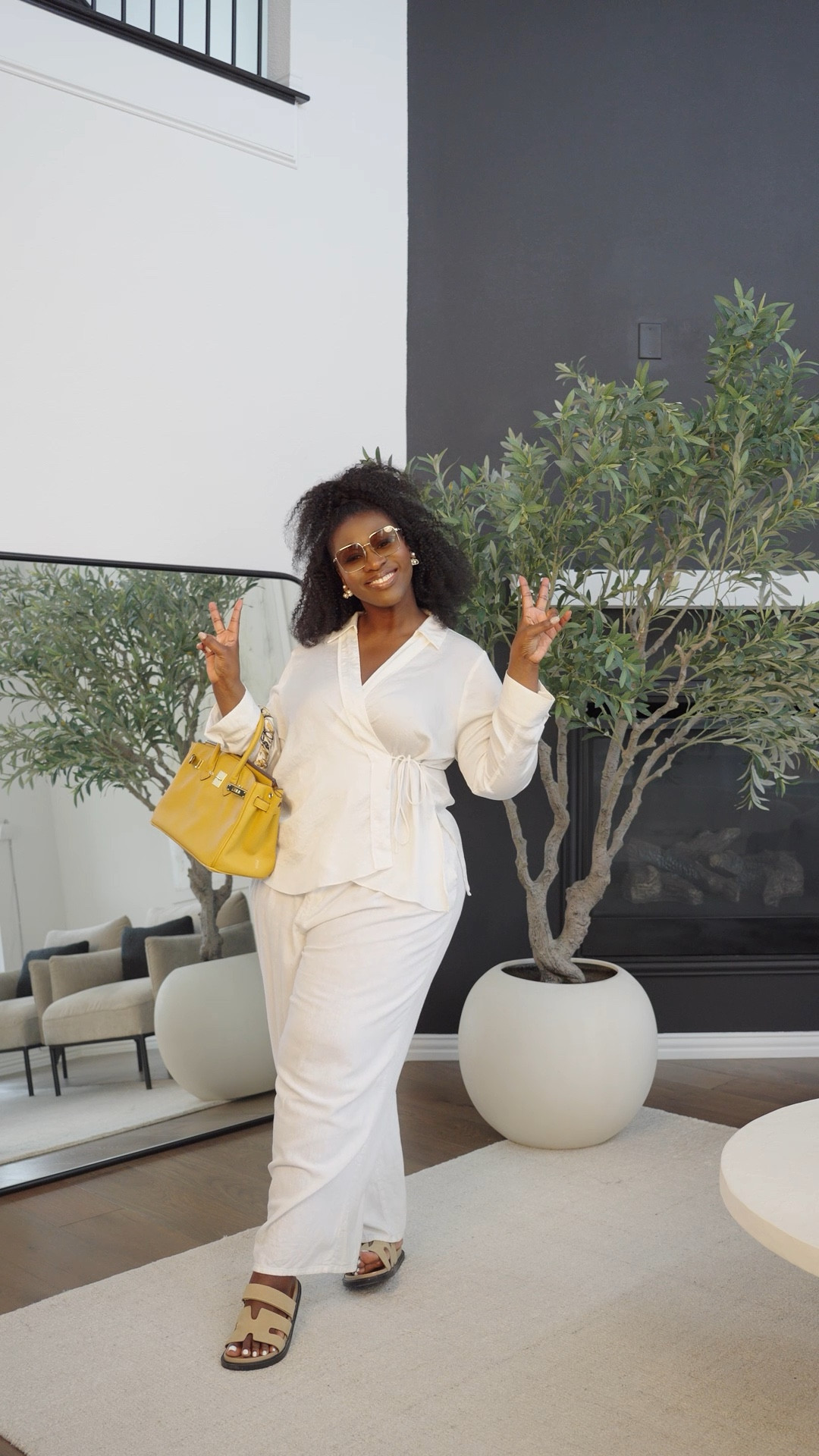 ✨ Texas heat has officially entered the chat, and I'm ready for it in my breezy linen moment! 💭 White linen is absolutely EVERYTHING for these warming May days - breathable, effortless and keeping me cool while still looking put together! The way this fabric moves with that Texas breeze... unmatched! 🌿

This all-white ensemble is my secret weapon for looking polished even when temperatures start climbing (and we know how Texas does summer, y'all). Added my pop of sunshine bag because even in the heat, we still bring the energy! ☀️

Who else is reaching for their linen already? May in Texas means summer starts early - drop a 🤍 if you're team linen all season long! #texasstyle #mayfashion #linenseason​​​​​​​​​​​​​​​​

#LTKSeasonal #LTKStyleTip #LTKFindsUnder100
