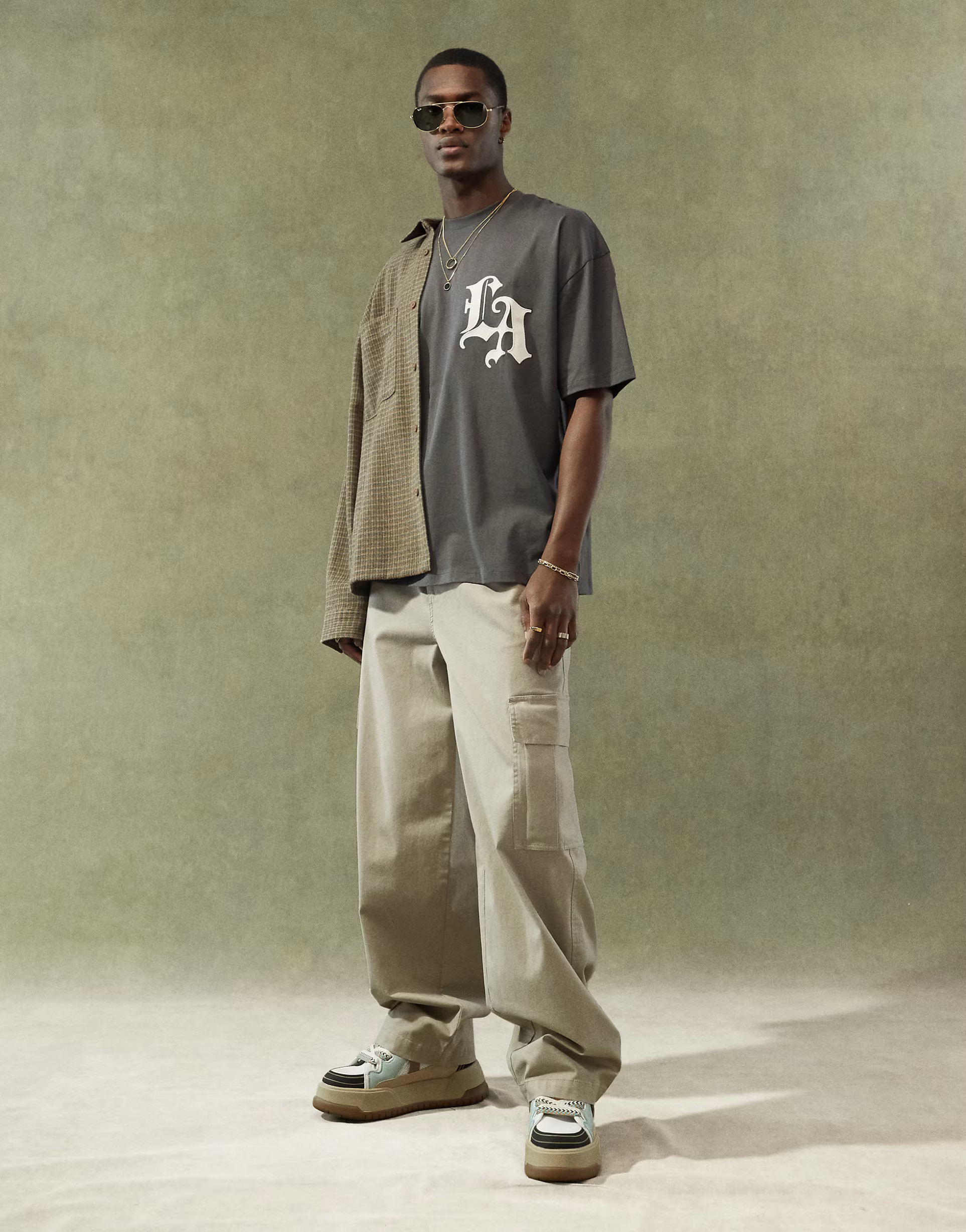 ASOS DESIGN loose cargo trousers with elasticated waist in beige | ASOS (Global)