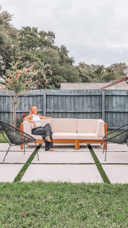 Relaxing in our backyard oasis with a coastal decor touch #coastaldecor #outdoorsofa #Kristopherknight #outdoordecor 

#LTKhome