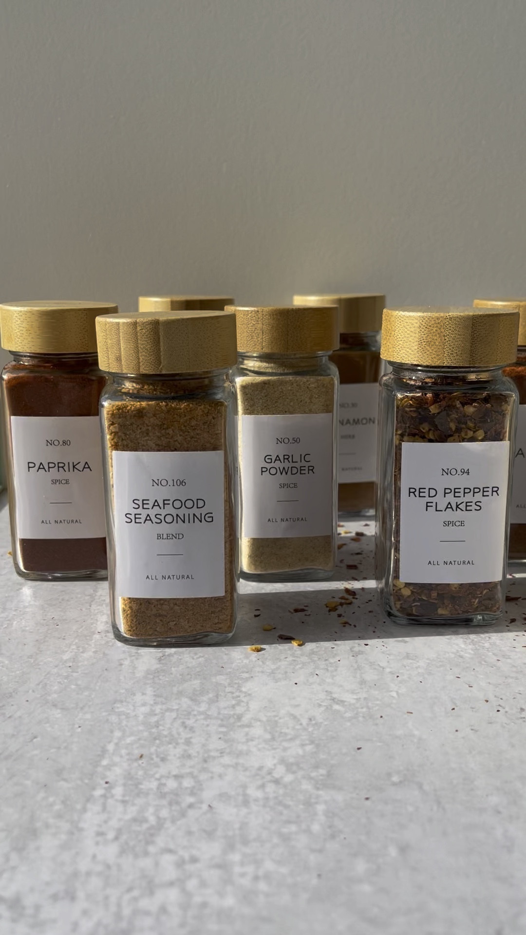 24 glass spice jars with bamboo lids on sale for $29!! Usually $55. Such a deal and makes a great cabinet upgrade or gift! 

#LTKunder100 #LTKhome #LTKunder50