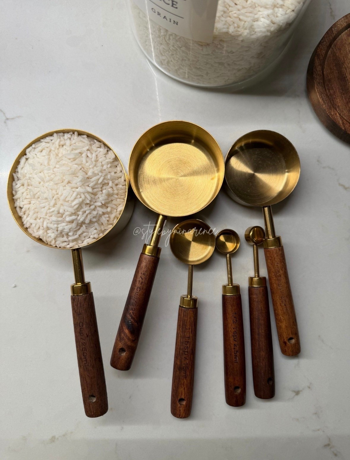 These measuring cups and spoons are both functional and beautiful, which makes them perfect for everyday use and countertop storage. The brass finish paired with the wood handles gives them a clean, elevated look that works in modern or neutral kitchens.

Each piece feels sturdy and well-made, with clearly marked measurements that make cooking and baking easier. I love that they double as decor when left out, instead of needing to be hidden in a drawer.

Linked here for easy shopping.


#LTKHome

#LTKdayinmylife #LTKHome #LTKmomlife