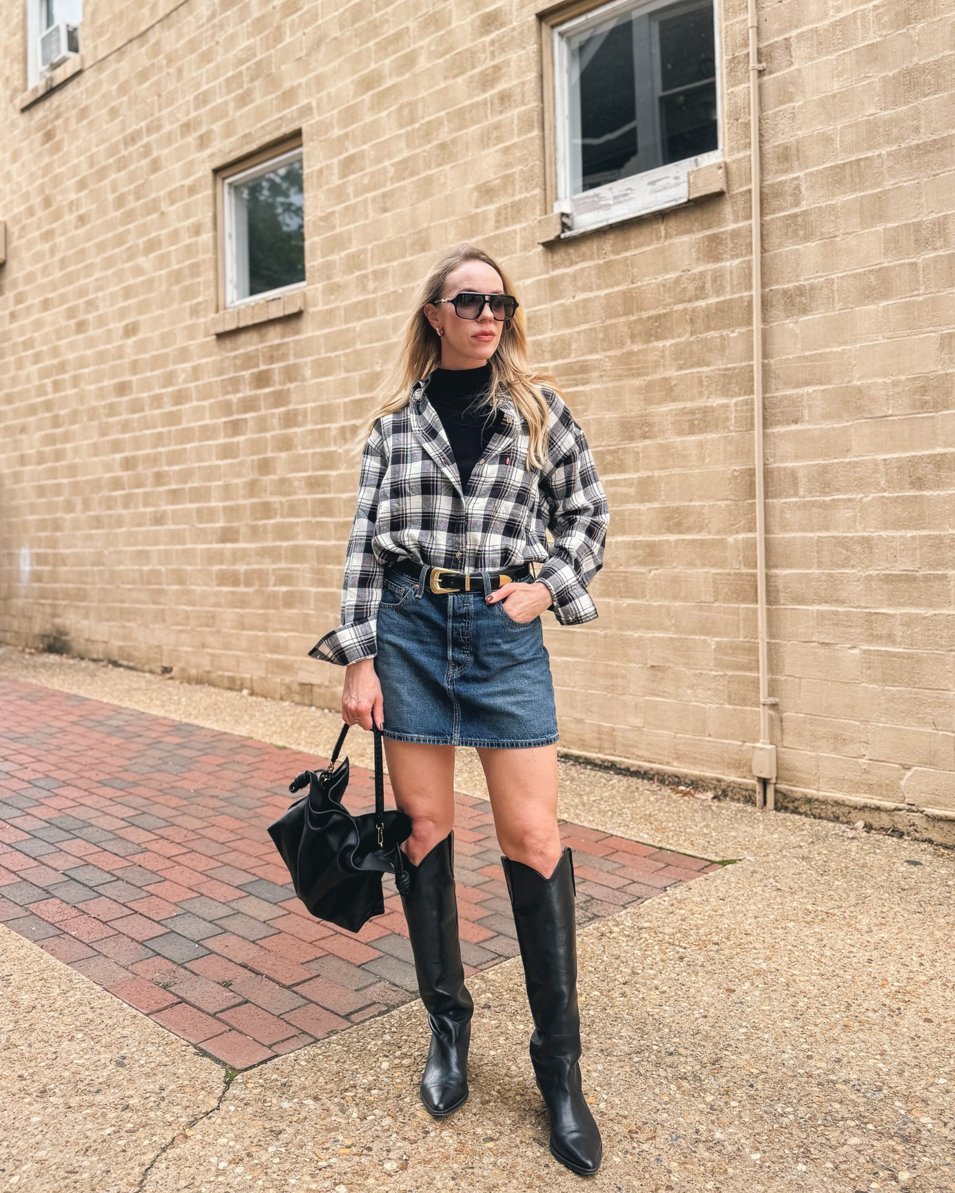 Western fall outfit with flannel shirt, denim mini skirt, black cowboy boots

#LTKSeasonal #LTKOver40 #LTKSaleAlert