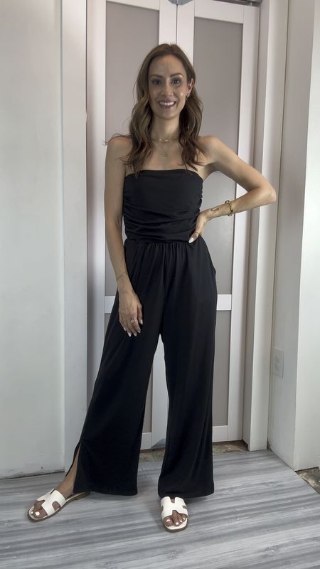 This comfy black strapless jumpsuit is so cute and can easily be dressed up or down. I love the side and ankle slits and there’s ruching around the core/tummy that is very flattering and forgiving! I’m wearing a small and I’m 5’4”. It comes in a few color options!

#LTKVideo #LTKFindsUnder50 #LTKParties