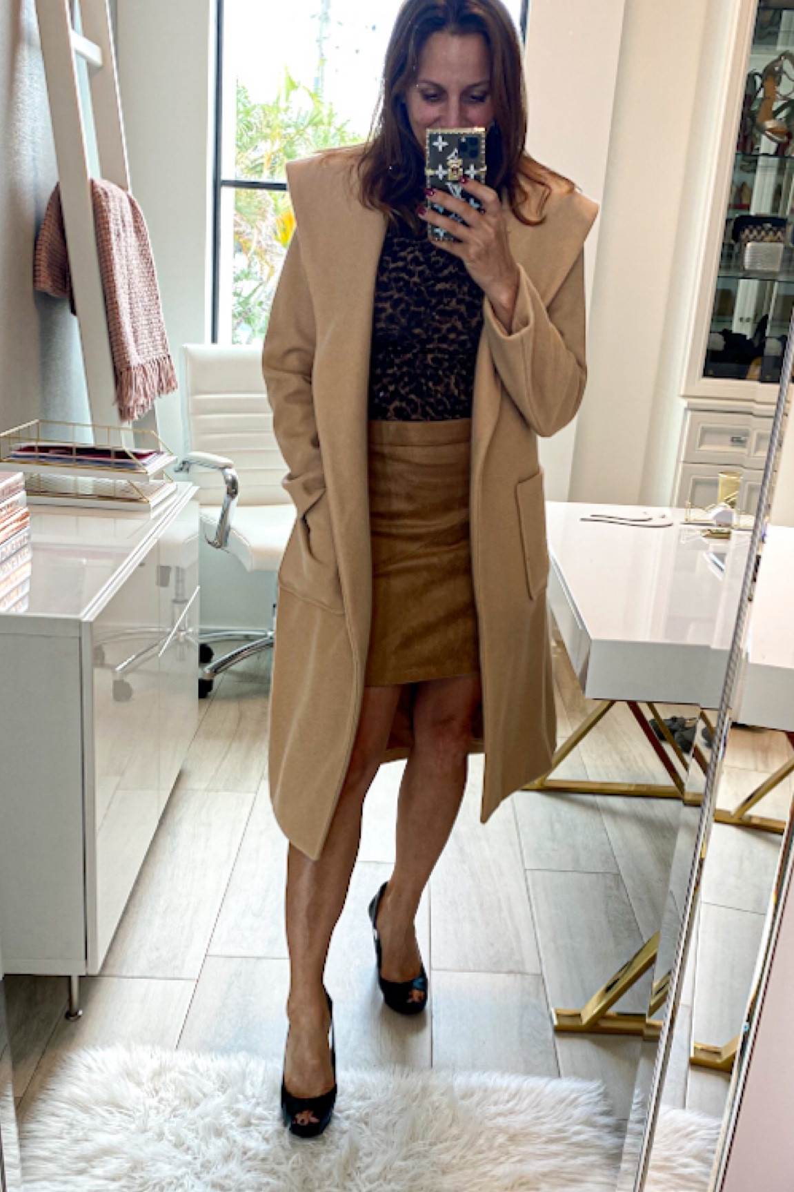 Winter Outfit
Never go wrong with neutrals
#longcoat
#tanskirt

#LTKshoecrush #LTKfindsunder50 #LTKstyletip