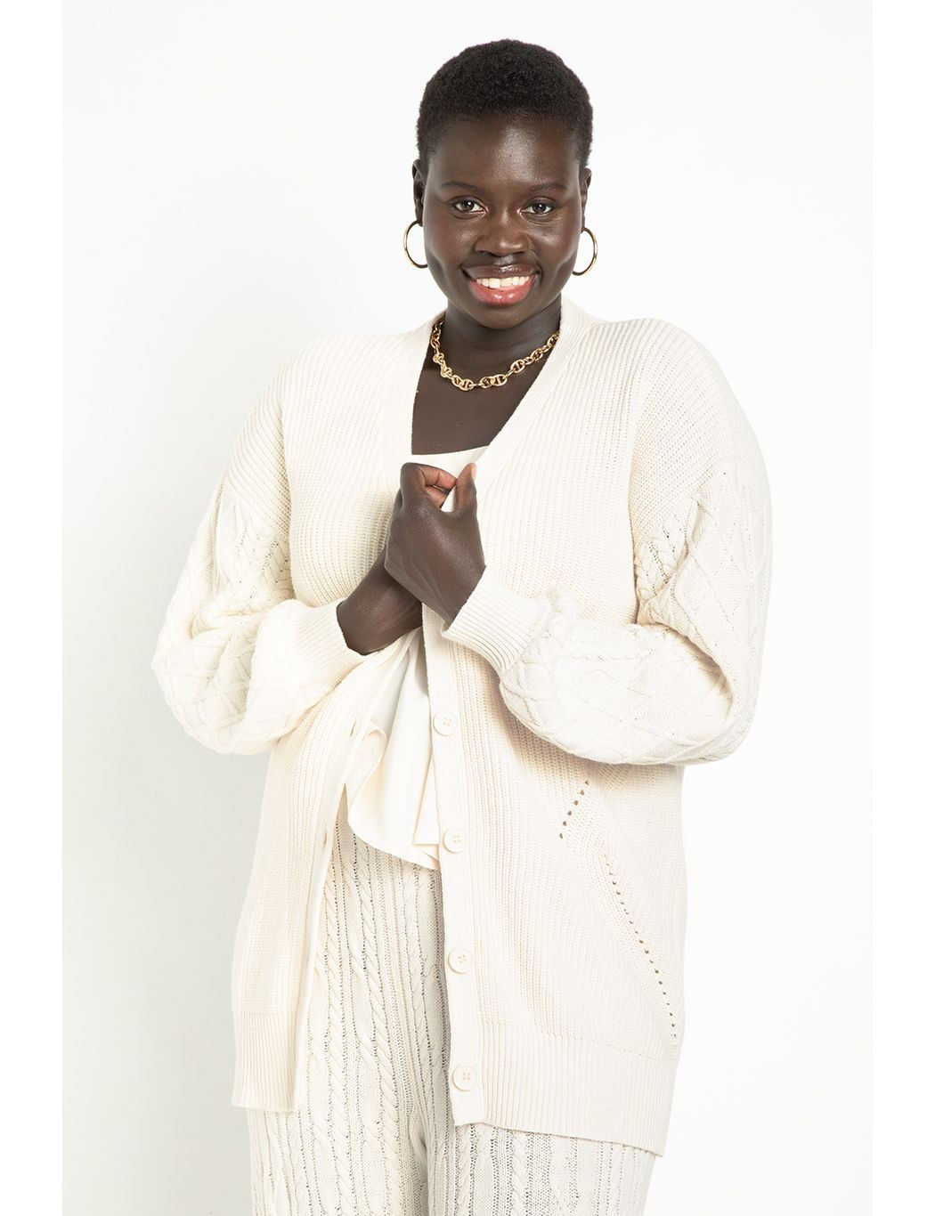 Open Neck Cable Stitch Sweater | Eloquii