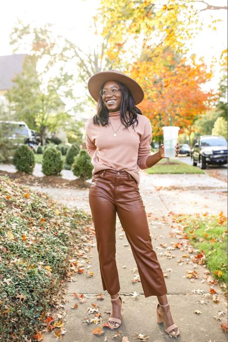 Fall outfits women - brown faux leather pants outfit - mock neck sweater - brown hats - tan fedora hat - revolve outfits - nude heels 


#LTKshoecrush #LTKunder100 #LTKSeasonal