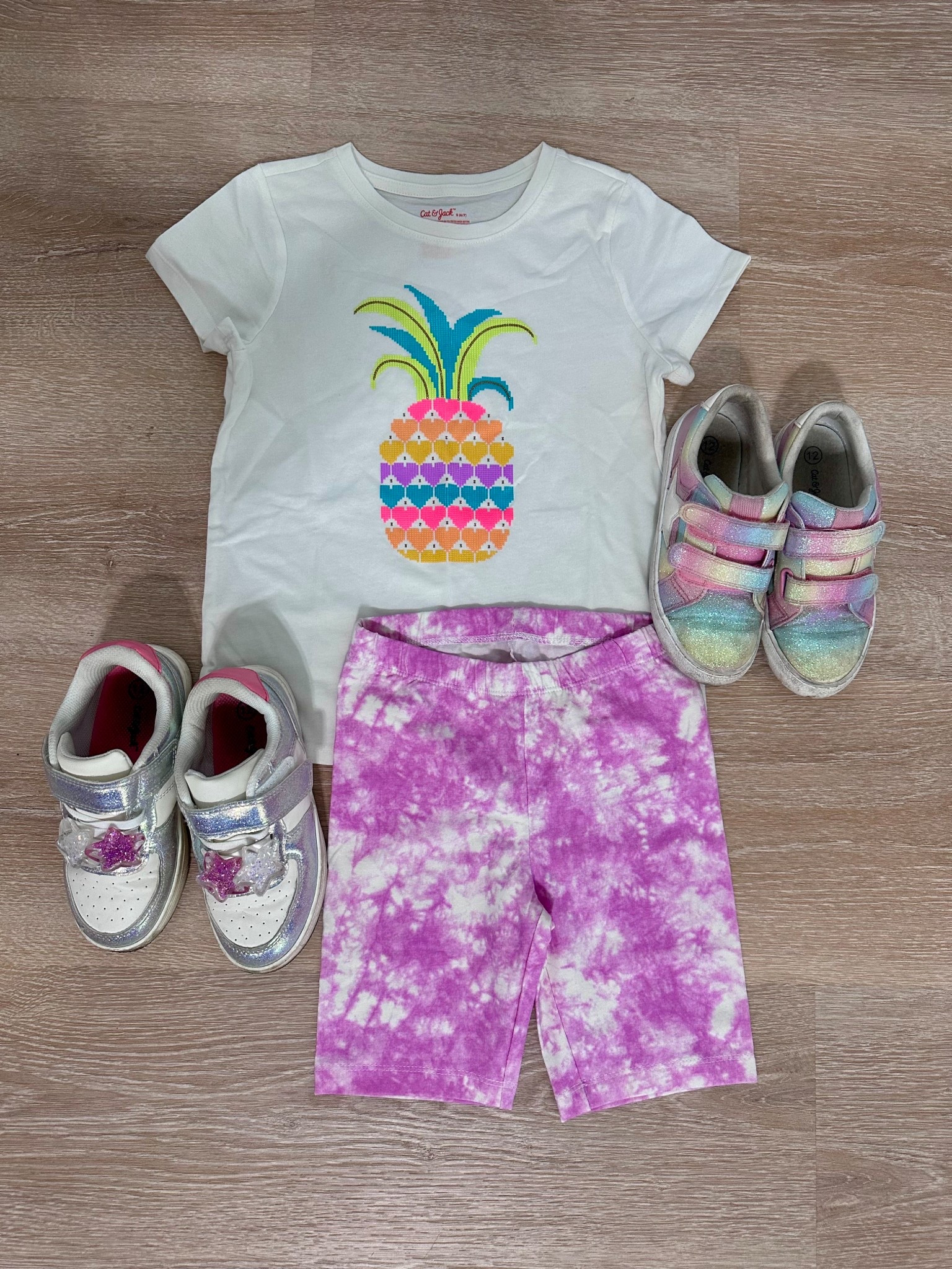 Bright, comfy, and playground-ready 🌈✨ This kids outfit is giving all the summer-to-school vibes—white graphic tee, purple tie-dye bike shorts, and the choice between glitter or court sneakers for all-day fun. #LTKKids #BackToSchoolStyle #LTKFamily #PlaygroundReady

#LTKKids #LTKSaleAlert #LTKFindsUnder50