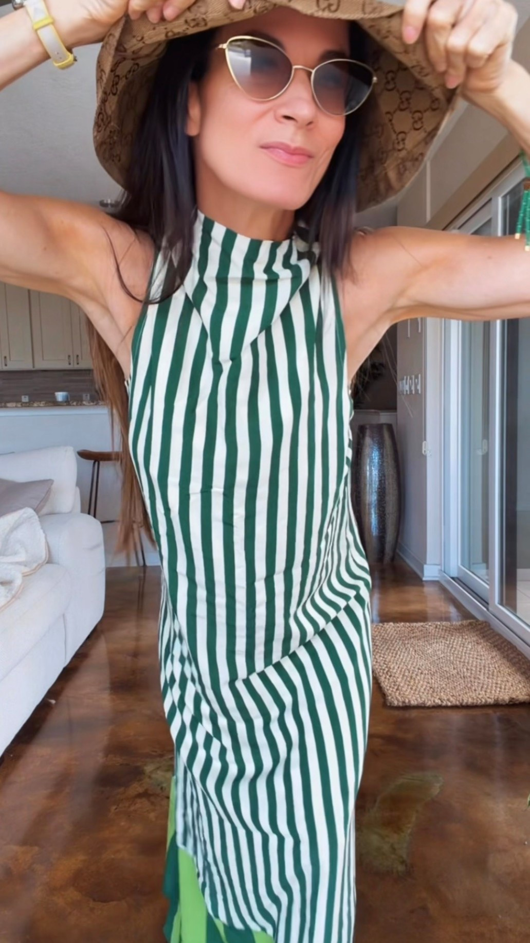 Feeling a little EXTRA lucky in this one 🍀💃🏻

This dress is giving effortless, flowy, and just the right amount of “where are you going looking like that?” energy... and honestly, I don’t have an answer other than wherever there’s sunshine and a cocktail 😏

The stripes, the movement, the whole vibe - she’s easy, she’s chic, and she does all the work for you (which is exactly the kind of energy I’m bringing into this week).

Paired it with my favorite sunnies + Chanel sandals + this hat moment and suddenly I’m booked, busy, and not answering emails✨🍸

Wearing XS

#NicoleColeeStyle #StPatricksDayStyle
#ResortWear #EffortlessChic #VacationVibes





#LTKdayinmylife #LTKgrwm #LTKootd