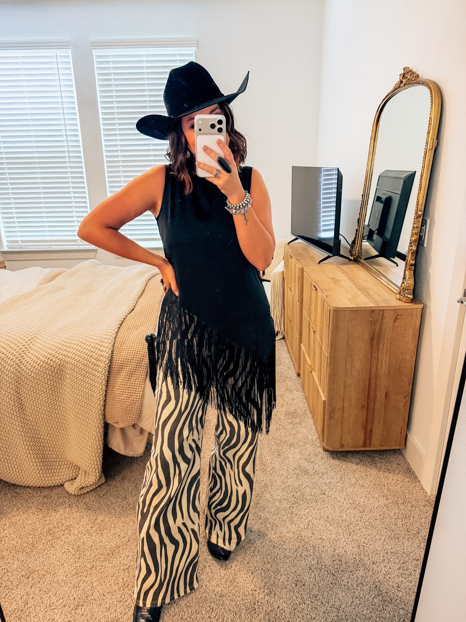 The perfect fringe top from Amazon - and zebra pants - rodeo , PBR, country concert , NFR

#LTKgrwm #LTKootd