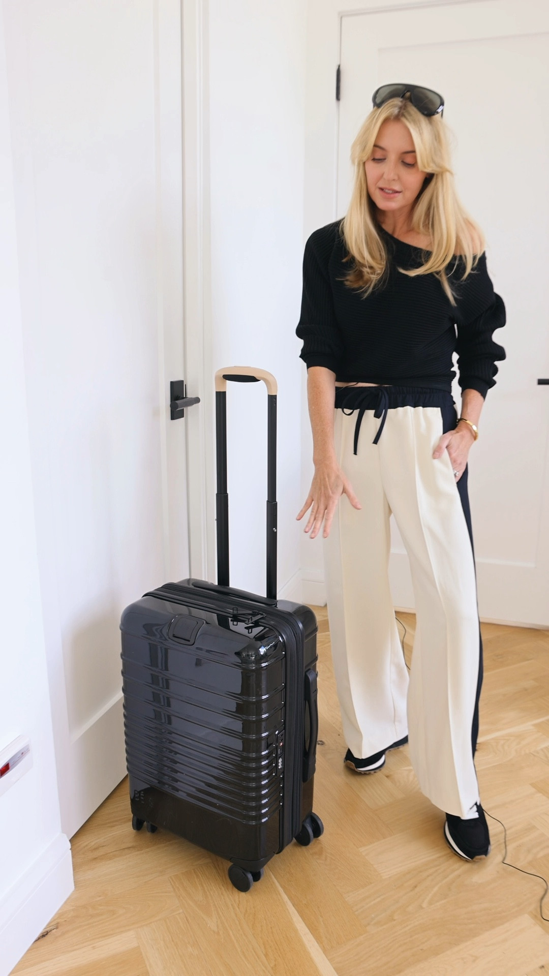I love how cool and effortless, yet super comfortable this travel outfit is. Also, this BÉIS carry-on roller bag is AMAZING! It has so many incredible features, it’s 22” (the largest carry-on size I’ve found), and the glossy black color is super chic. It also comes in medium and large checked bag sizes. 

P.S. If you love organization as much as I do, the coordinating BÉIS packing cubes are a MUST! 

~Erin xo 

#LTKStyleTip #LTKTravel