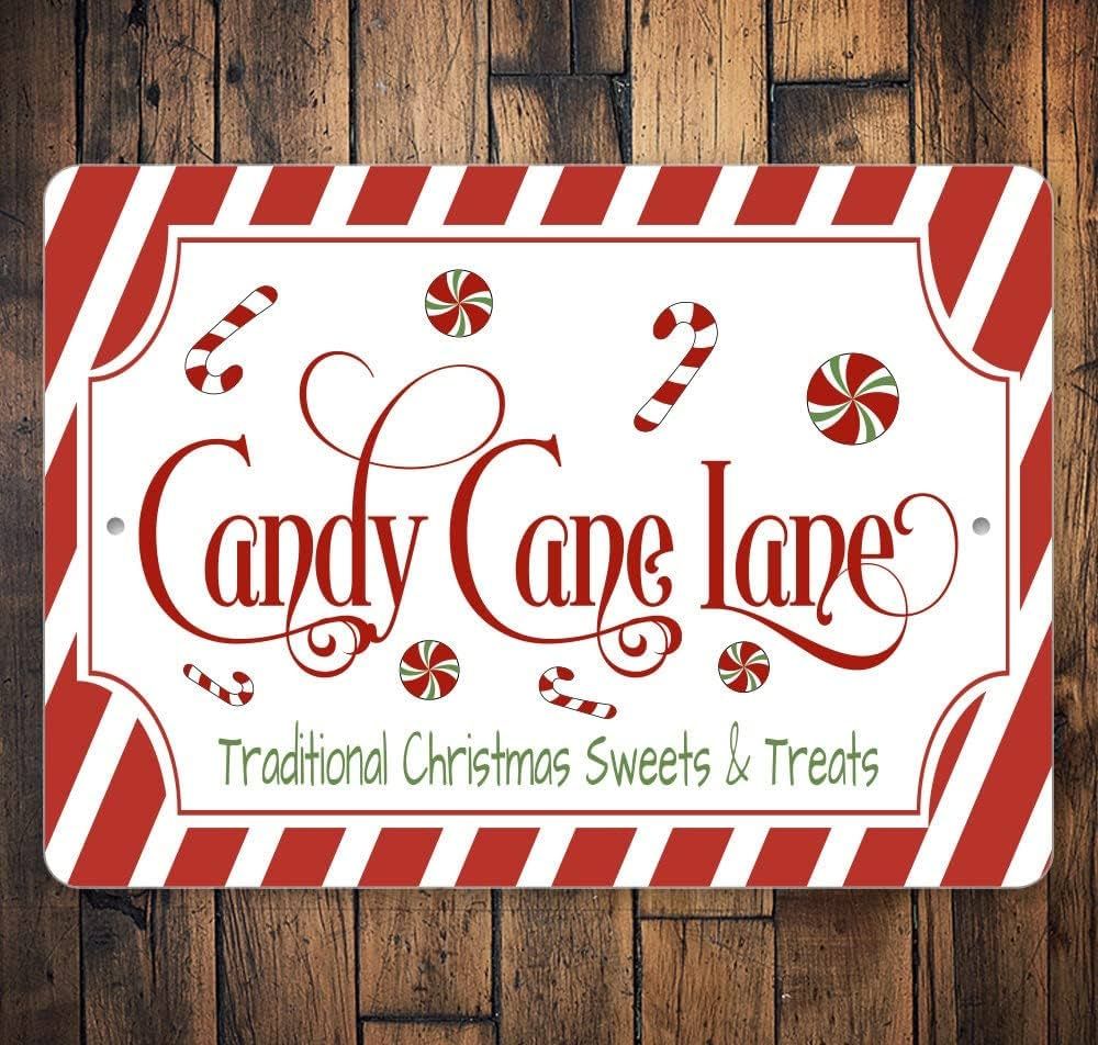 Cartel de metal retro de Candy Cane Lane con estampado de dulces y golosinas de Navidad, arte de par | Amazon (US)