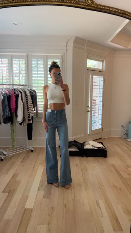 These J.Crew jeans are EVERYTHING! I’m 5’10 and wearing a 26 tall. (They come in other lengths too) 
If you are in between sizes, I would suggest sizing down. Because the jeans are high waisted and hit at the small part of your waist. It is a tiny bit loose there! I did my true size 26, but considering sizing down one size. #jeans #denim 

#LTKSeasonal #LTKstyletip #LTKover40