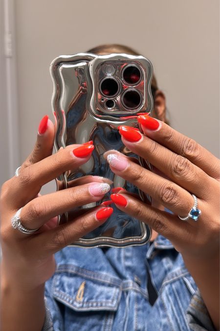 Holiday nails. Not a huge fan of red on me so I went moreso tangy orange! #AKCESSME #holidaynails #chromephonecase #davidyurman

#LTKSeasonal #LTKHoliday