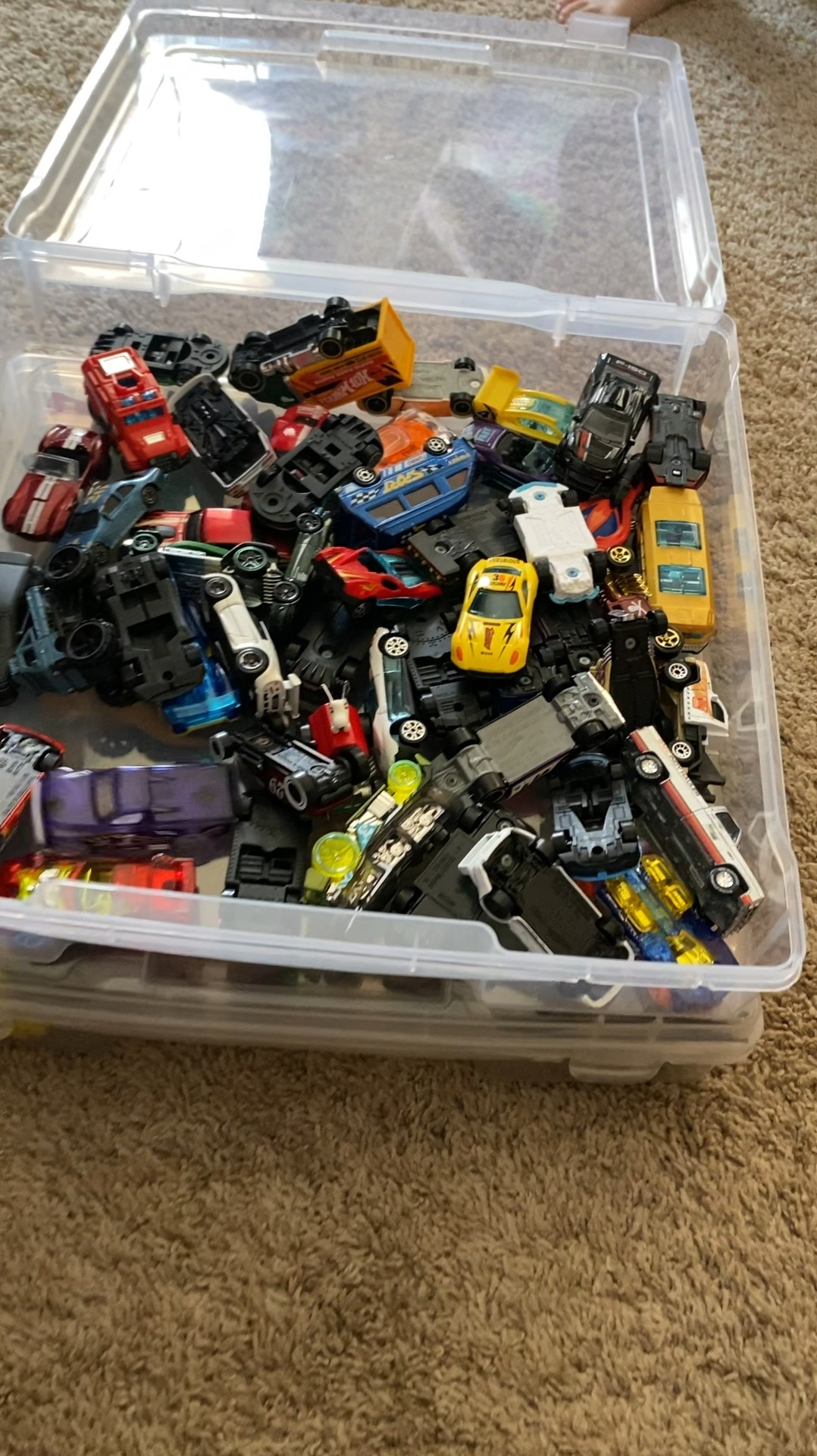 The best containers for toy storage! Slim and stackable clear containers to store hot wheel cars, dinosaurs, magnatiles, legos, farm animals and more! The possibilities are endless and they slide right under the couch for a clean living room. 
Organizers, containers, toy storage, kids toys, playroom, get organized, toy basket.

#LTKFamily #LTKKids #LTKHome