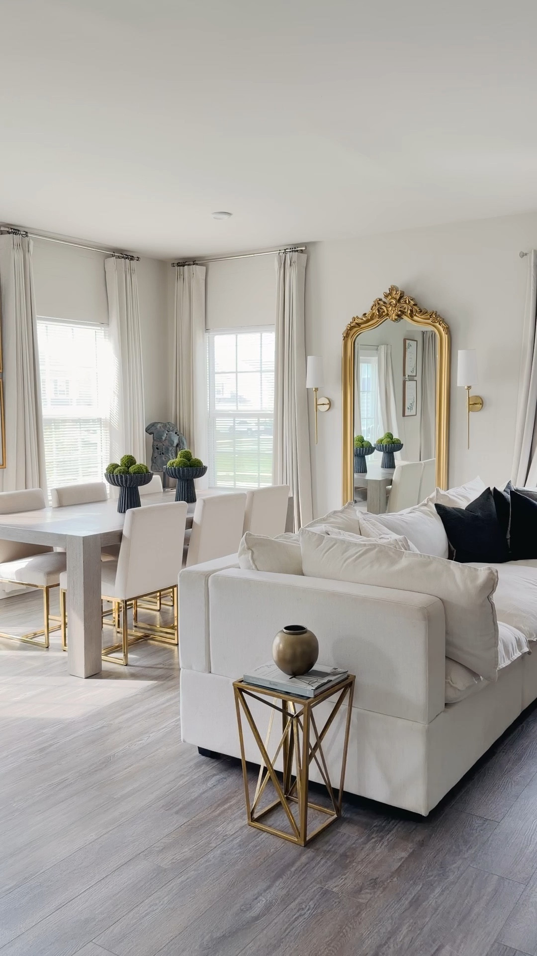 Pinch pleated luxury curtains, gold mirror, dining table, side table, cloud sectional , wall scones

#LTKHome
