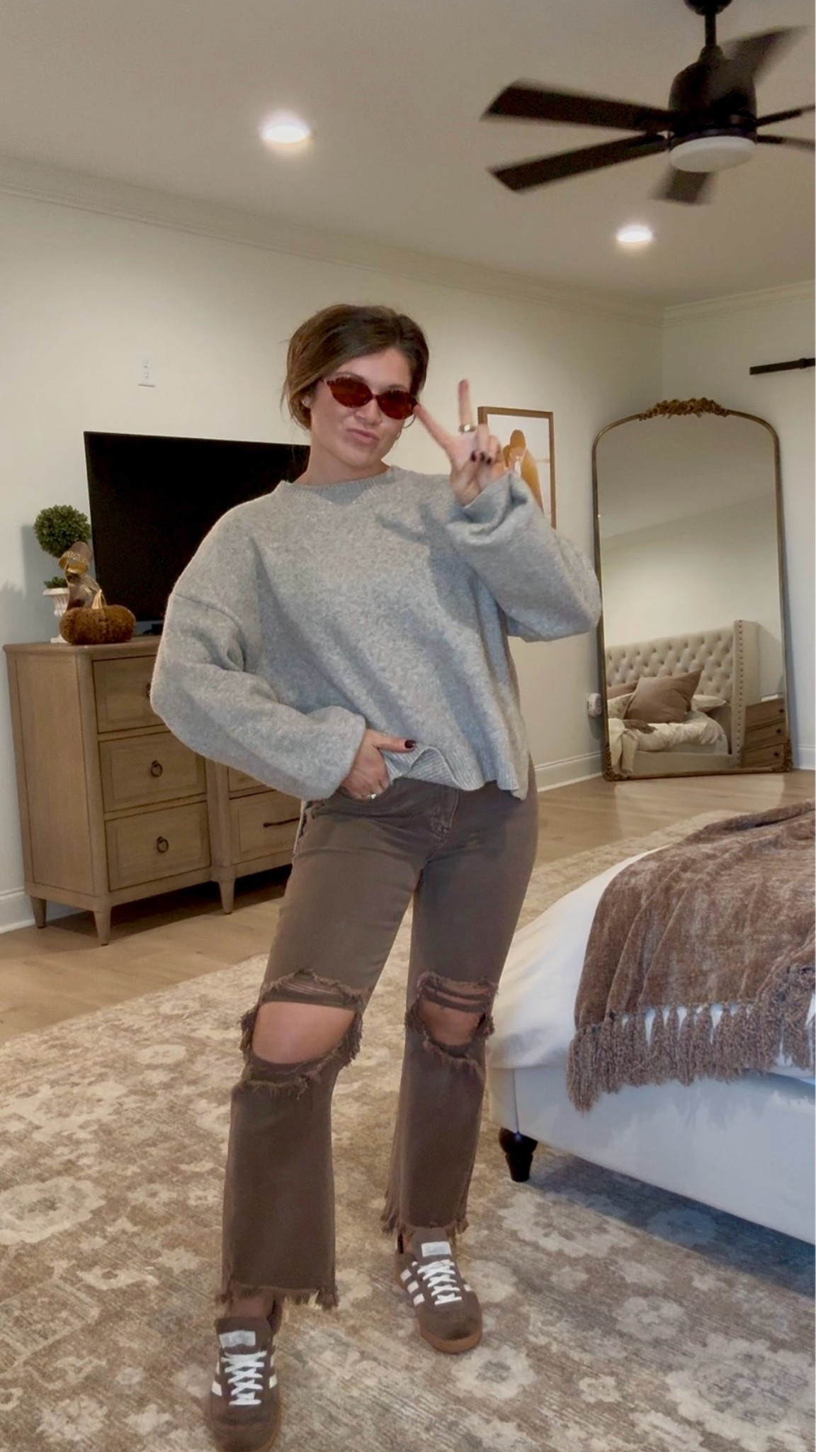 Easy fall uniform 🤎☕️ distressed denim, an oversized sweater + sneakers will always be a yes from me.

#LTKootd #LTKmomlife #LTKSeasonal
